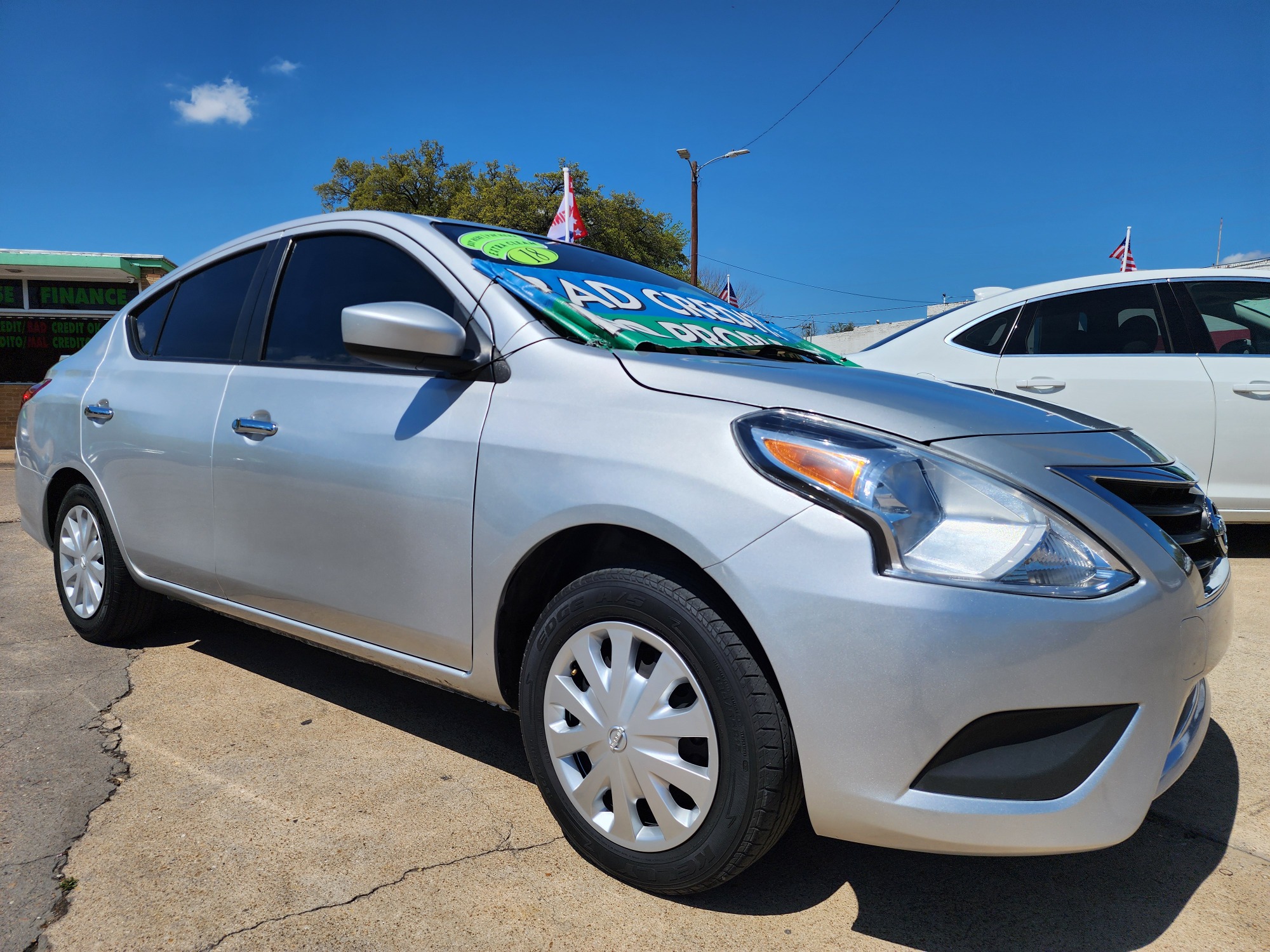 2018 SILVER Nissan Versa SV (3N1CN7AP7JK) with an 1.6L L4 DOHC 16V engine, CVT transmission, located at 2660 S.Garland Avenue, Garland, TX, 75041, (469) 298-3118, 32.885551, -96.655602 - Welcome to DallasAutos4Less, one of the Premier BUY HERE PAY HERE Dealers in the North Dallas Area. We specialize in financing to people with NO CREDIT or BAD CREDIT. We need proof of income, proof of residence, and a ID. Come buy your new car from us today!! This is a SUPER CLEAN 2018 NISSAN VER - Photo #1